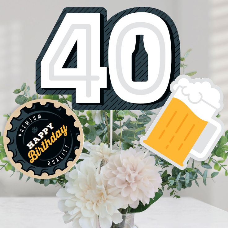 a birthday cake topper with the number forty and a beer mug next to it