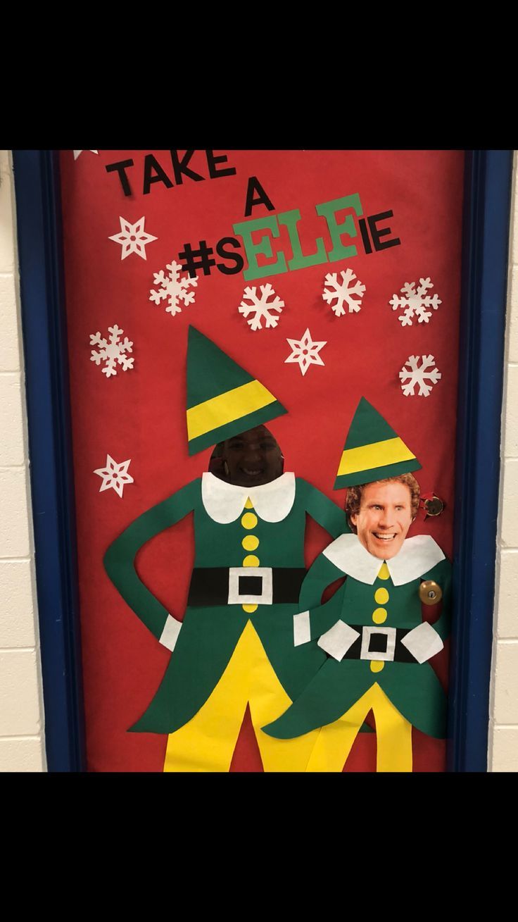 a door decorated with two elfs and snowflakes