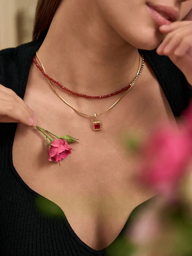 Our dazzling Princess Cut Lab Grown Ruby Pendant Charm is a true embodiment of elegance and ethical luxury. This exquisite pendant features a brilliant 2-carat princess-cut lab-grown ruby, meticulously crafted to showcase its fiery red hue and exceptional sparkle. Suspended from a delicate chain, this charm adds a touch of sophistication and allure to any neckline. Embrace the beauty of lab-grown gemstones and make a bold statement with this radiant pendant charm. Details Recycled Silver: 18ct g Dazzling Lab-created Ruby Jewelry As Gift, Dazzling Lab-created Ruby Jewelry For Gift, Red Asscher Cut Diamond Jewelry, Luxury Ruby Jewelry Radiant Cut, Red Diamond Radiant Cut Jewelry, Fine Jewelry Ruby With Radiant Cut, Luxury Radiant Cut Ruby Jewelry, Red Radiant Cut Diamond Jewelry, Elegant Asscher Cut Birthstone Jewelry