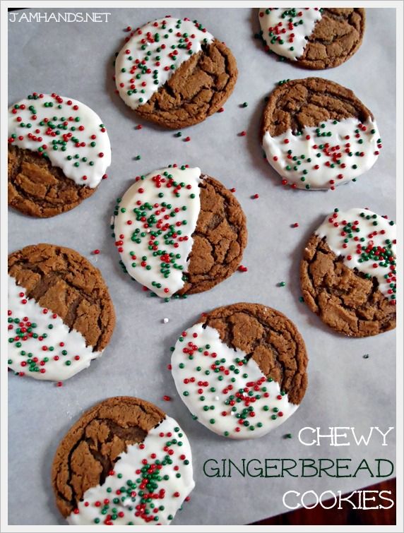 six cookies with white frosting and sprinkles