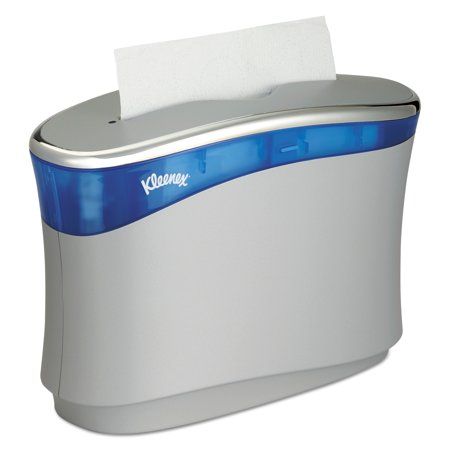 a roll of toilet paper sitting on top of a tissue dispenser