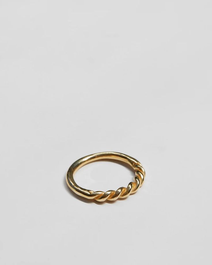 This soft and sumptuous gold ring was formed by twisting two strands of pliable sculpting wax to and then molding the braid in to a perfect, organic band that you'll never want to take off.  Lovely alone or great in a stack.  Available in 10k or 14k gold, each piece is individually sculpted by hand in our studio and ca Modern Twist Twisted Promise Ring, Modern Twisted Shape Promise Ring, Modern Twisted Promise Ring, Modern Twist Stackable Rings For Promise, Modern Twist Yellow Gold Twisted Stackable Rings, Modern Twist Stackable Twisted Promise Rings, Stackable Twisted Rings For Promise, Modern Twist 14k Gold Twisted Ring, Twisted 14k Gold Rings With Modern Twist