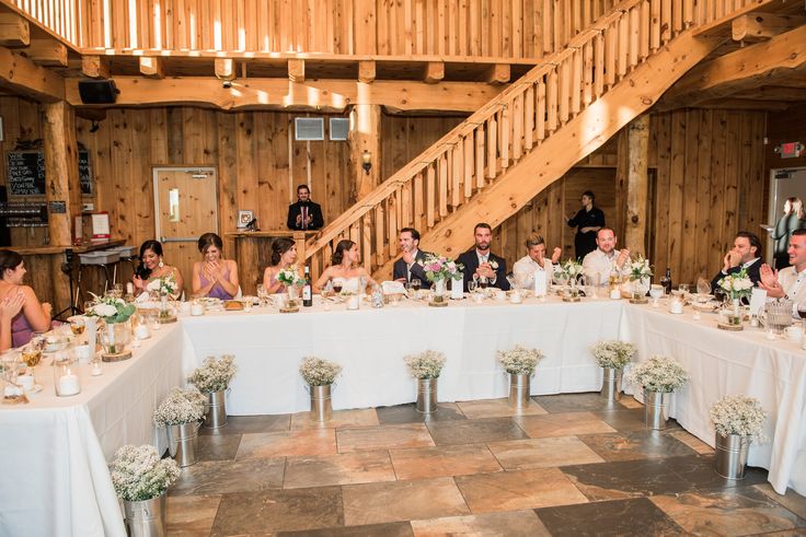 a group of people sitting around a table