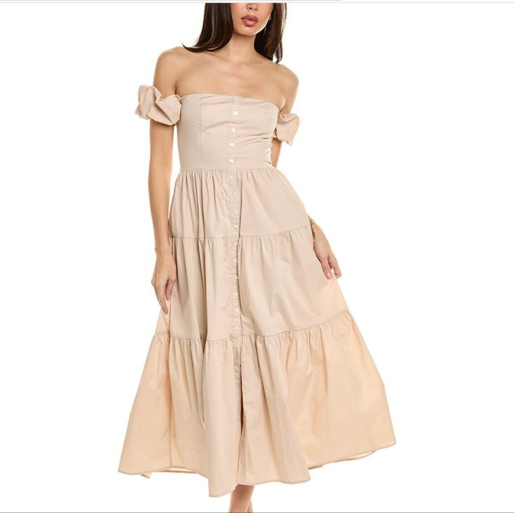 98% Cotton, 2% Spandex Tiered Skirt Midi Dress Button Front Dry Clean Only Sizes 00-12 Model Is 5'10" And Wearing A Size 2 Staud A-line Dresses For Spring, Staud Summer A-line Dress, Fitted A-line Maxi Dress With Button Closure, Off-shoulder Midi Dress For Casual Wear, Elegant Staud Spring Maxi Dress, Elegant Staud Maxi Dress For Spring, Staud Elegant Maxi Dress For Spring, Fitted Dress With Button Closure For Brunch, Spring A-line Maxi Dress With Button Closure