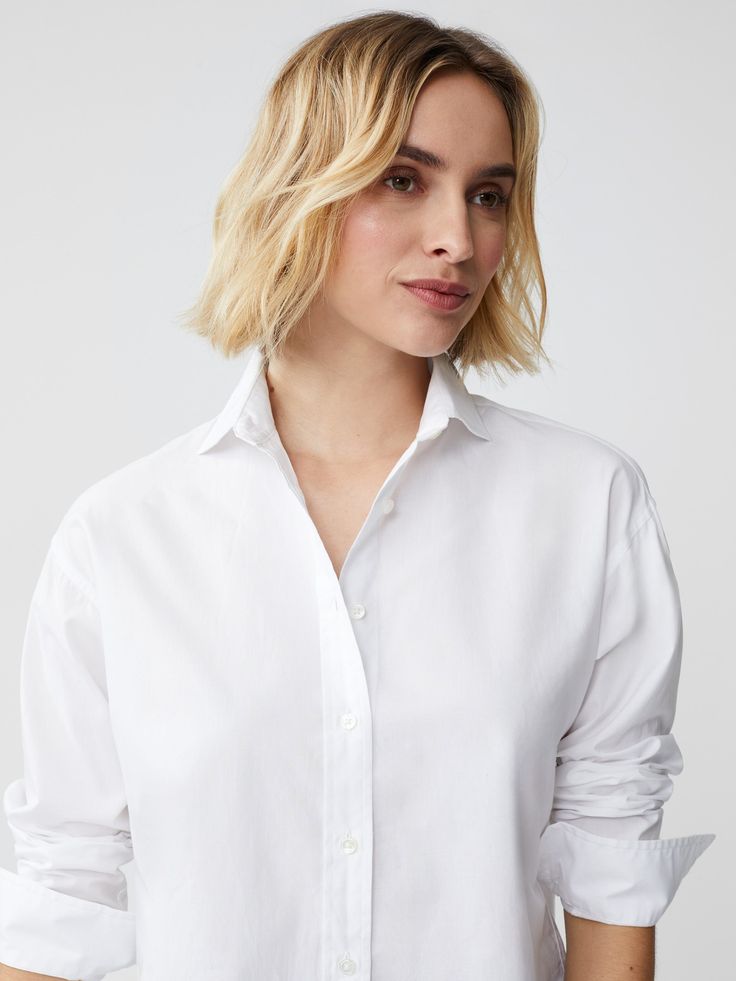 Worn by style icons of the past and present, there's something so timeless about a classic button-down shirt. Our newest addition to the line up is crafted in 100% cotton with a drop shoulder that's somewhere between structured and relaxed. For a menswear-inspired look, cuff the sleeves. | J.McLaughlin Women's Finn Shirt White, Size Medium | Cotton Timeless Relaxed Fit Top With Button Cuffs, Timeless Relaxed Fit Tops With Button Cuffs, Relaxed Fit Top With Button Cuffs, Timeless Daywear Tops With Placket, Timeless Tops With Placket For Daywear, Timeless Shirt With Button Cuffs And Relaxed Fit, Timeless Relaxed Fit Shirt For Work, Timeless Relaxed Fit Workwear Shirt, Timeless Button-up Tops With Placket