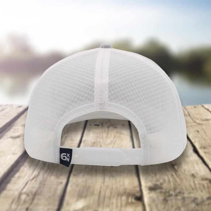 The ultimate water-resistant fishing accessory for avid tuna anglers is The Tuna Chaser hat. This stylish hat comes in a sleek white and gray color scheme and features a bold Six Knots Performance Fishing tuna badge on the front. Crafted with the highest quality materials, this hat is designed to keep you cool and comfortable all day long. The mesh back provides excellent ventilation, allowing air to flow freely and keep your head dry and sweat-free, even during those long and grueling fishing e Adjustable White Snapback Hat For Outdoor Activities, White 5-panel Hat For Outdoor Activities, White Breathable Snapback Hat For Outdoor Activities, White Six-panel Trucker Hat For Outdoor Activities, White Six-panel Snapback Hat For Outdoor Activities, Adjustable White Baseball Cap With Breathable Mesh, White Breathable Trucker Hat For Outdoor, White Breathable Mesh Snapback Baseball Cap, White Sporty Snapback Hat For Outdoor