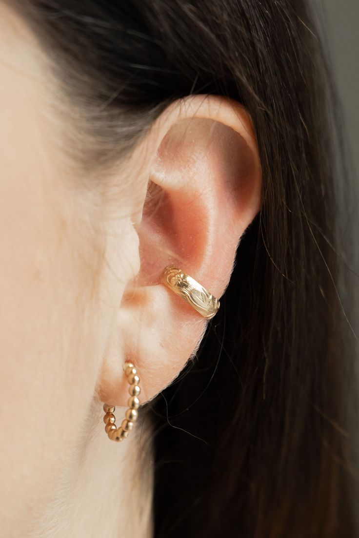 Flora Ear Cuff Made in 14k gold filled meaning it is tarnish resistant, water resistant, and the gold won't flake off! With proper care, gold filled metal can last many years.  Handmade Ethically Made Made in small batches Crescent Moon Ring, Wrap Earrings, Gold Ear Cuff, Moon Ring, Evil Eye Necklace, Eye Necklace, Cuff Earrings, Link Necklace, Small Batches