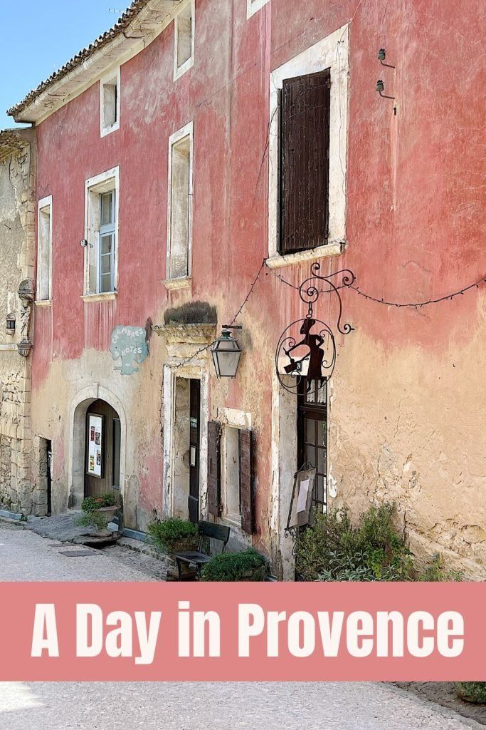 an old building with the words a day in provence