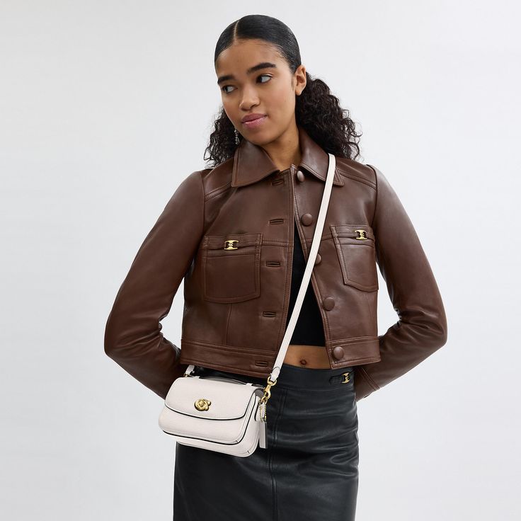 Our structured Cassie crossbody has classic good looks and ample room to hold everyday essentials with three organized compartments. A more compact version of the original the 17 is crafted of refined pebble leather and finished with our iconic turnlock closure. Style the versatile bag three ways: carry by hand with the ladylike top handle wear on the shoulder with the elegant chain strap or crossbody with the adjustable leather strap. | Coach Cassie Crossbody Bag 17 - Women's Designer Crossbody Coach Top Handle Bag, Classic Satchel With Cc Turnlock Closure, Classic Everyday Bag With Cc Turnlock Closure, Classic Shoulder Bag With Cc Turnlock Closure For Everyday, Classic Flap Bag With Cc Turnlock For Work, Coach Crossbody Shoulder Bag With Turn-lock Closure, Classic Satchel With Cc Turnlock Closure For Work, Everyday Double Flap Shoulder Bag With Cc Turnlock, Classic Everyday Flap Bag With Turn-lock Closure