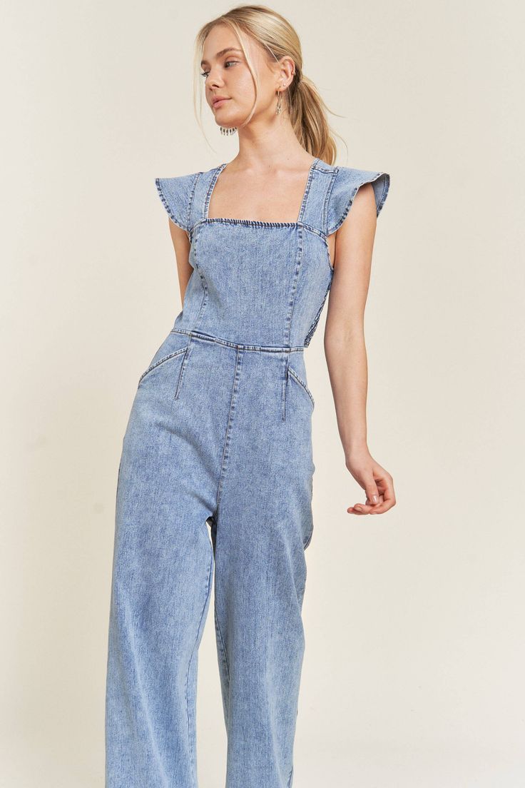 CUTENESS OVERLOAD! This wide leg denim jumpsuit is perfect for spring and summer, with playful tie details, smocked backing, and ruffle sleeves. Don't miss out on this must-have piece! Fits true to size Ruffle Sleeves, Denim Jumpsuit, Wide Leg Denim, Cuteness Overload, Smocking, Must Haves, Cool Outfits, Wide Leg, Jumpsuit