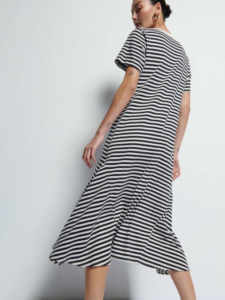 It's your essential t-shirt dress, now with subtle seamed pleats on the front for an effortlessly feminine silhouette. Perfect for moving from off-duty to on-duty with nothing more than a chic belt around the waist. (This one comes in City Stripe.) | Eileen Dress in City Stripe | Ethical Essentials Chic Belt, Striped T Shirt Dress, Stripe T Shirt, Feminine Silhouette, Nothing More, Off Duty, T Shirt Dress, Shirt Dress, T Shirt