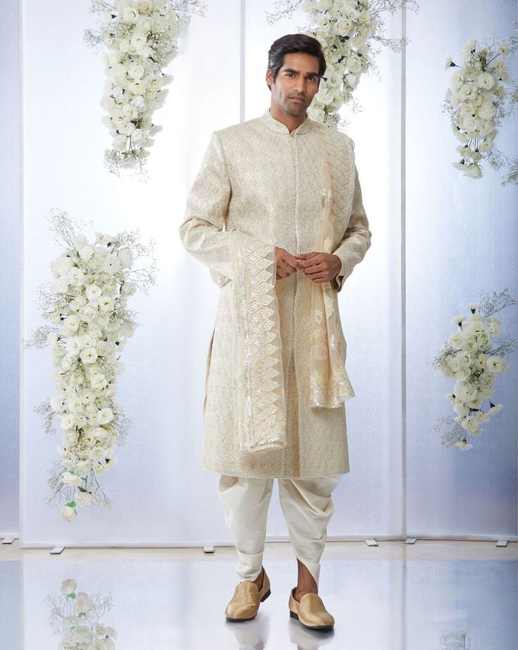 This sherwani set features appliques in soft lemons and pinks. It is paired with an off-white silk kurta and cotton a silk afghani salwar. Complimenting stole and footwear is also available.From Seema Gujral's Tuscan Summer collection. DELIVERY TIMEPlease allow 8-12 weeks for your outfit to arrive.FABRIC DETAILSNetProfessional cleaning only. Afghani Salwar, Pink Sherwani, Tuscan Summer, Seema Gujral, Embroidered Sherwani, Salwar Pants, Sherwani Groom, Wedding Sherwani, Silk Kurta