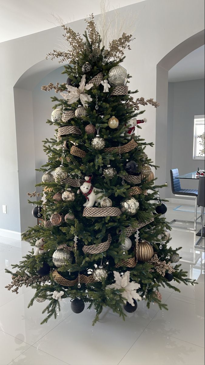 a decorated christmas tree in a living room