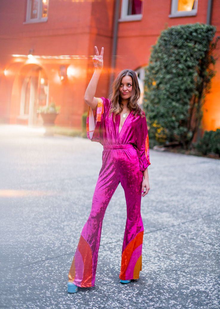 Who says you can't wear Mamie out to dinner, to a formal or to feel a little fancy? As seen on Amazon Prime's Making The Cut, this jumpsuit is a stunner on and off the runway. Model is 5'7 wearing a size small (: - 70s inspired flare jumpsuit - deep V neck - crushed velvet - exclusive design Measurements -Bust 22in -Length 52in -Waist 14in Womens Ziggy Stardust Costume, Velvet Jumpsuit Costume, Plus Size Dolly Disco, Plus Size 70s Disco, Disco Party Outfit Women, Disco Fashion Women, 70s Disco Party Outfit, 70s Party Outfit, Studio 54 Fashion