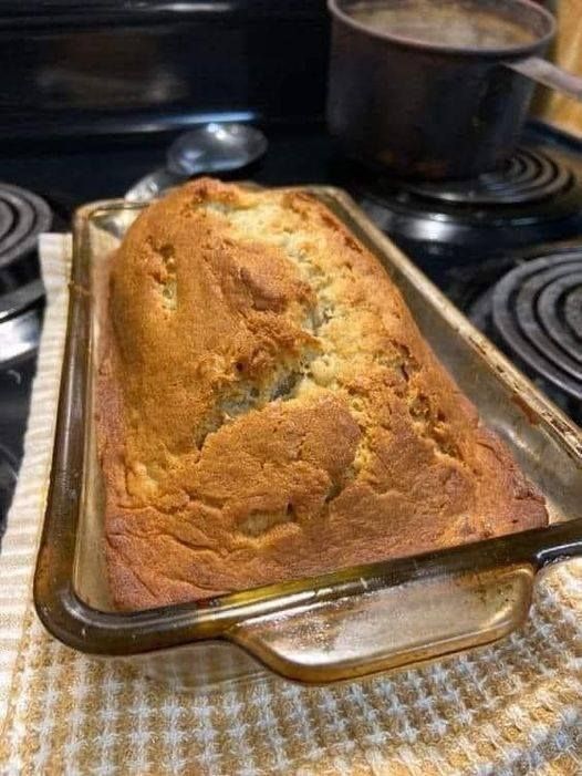 a loaf of bread sitting on top of a pan