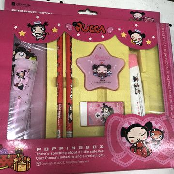 the package includes two pens, an eraser and a pen with cartoon characters on it