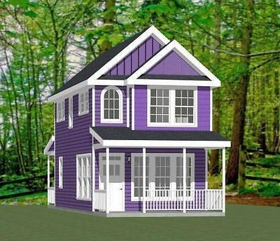 a purple and white house in the woods