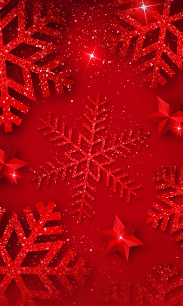 red snowflakes on a red background with stars and sparkles in the air