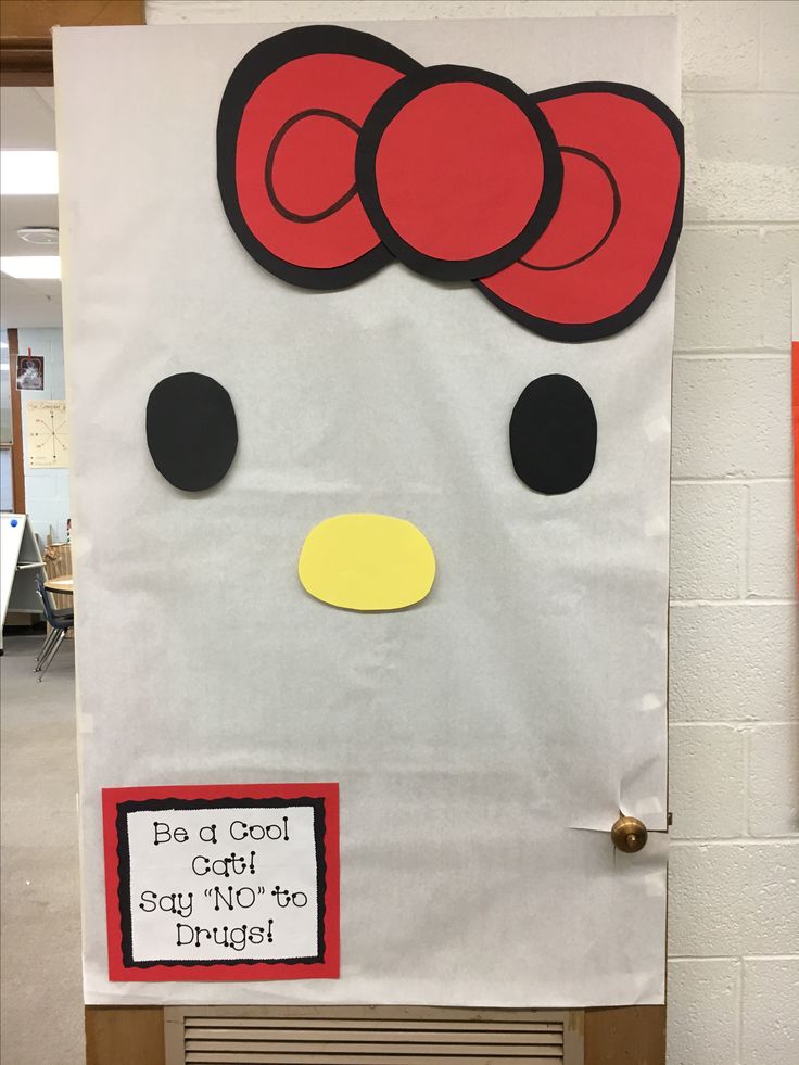 a bulletin board with a hello kitty face on it