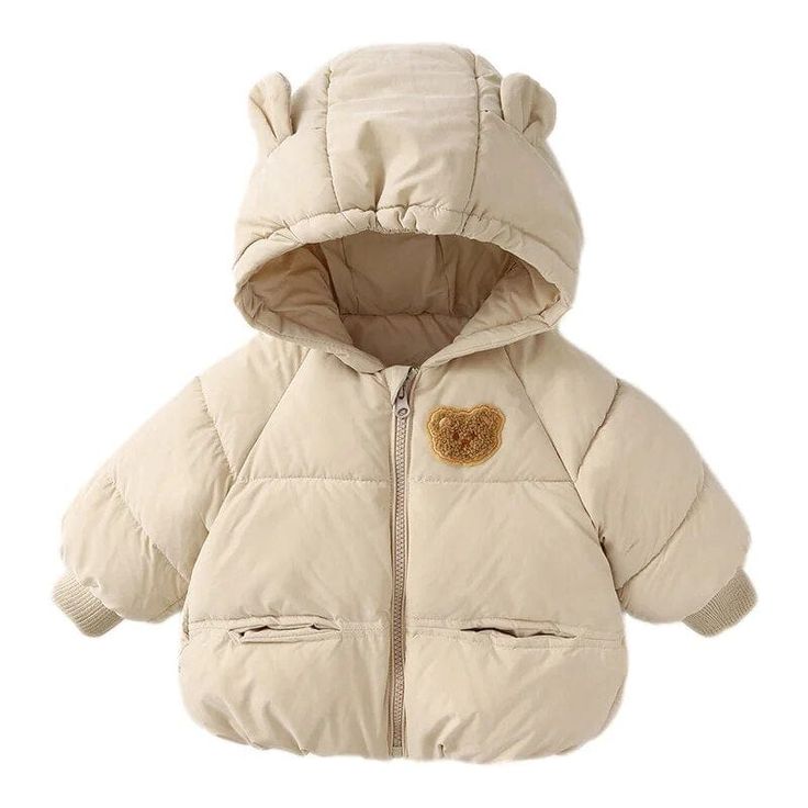 Introducing our Bear Hooded Puffer Jacket – the perfect blend of warmth, style, and fun for your little one. Crafted with care, this quilted jacket is made from durable nylon, ensuring it can withstand the adventures of childhood while keeping your child warm and cozy. The highlight of this jacket is its adorable detachable hood, complete with cute bear ears. Your child will not only stay warm but also look absolutely charming in this unique feature. The front zipper makes it easy to put on and