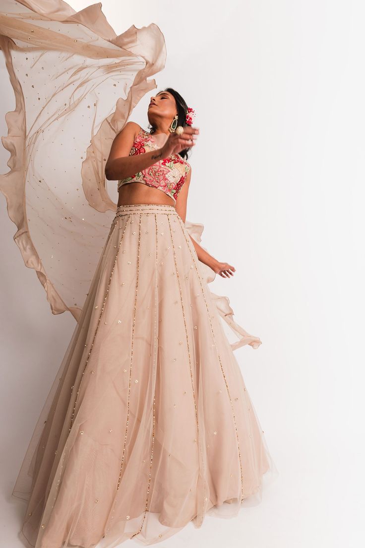 Beige high waist lehenga with sequin, bead and pearl embroidered motifs. Comes with crop top and dupatta.
Components:3
Embroidery
Neckline:Round
Sleeve Length:Sleeveless
Fabric:Tulle
Color:Beige
Applique embroidered floral motifs and sequin and pearl motifs on top
Sheer dupatta with sequin motifs and ruffle border - Aza Fashions Party Wear Anarkali Set With Pearl Embroidery For Reception, Bollywood Style Choli With Pearl Embroidery For Receptions, Bollywood Choli With Pearl Embroidery For Reception, Party Wear Choli With Pearl Embroidery For Reception, Bollywood Pearl Embroidered Choli For Reception, Festive Party Wear Lehenga With Pearl Embroidery, Anarkali Choli With Pearl Embroidery For Festivals, Anarkali Choli With Pearl Embroidery In Organza, Party Wear Lehenga With Pearl Embroidery For Reception