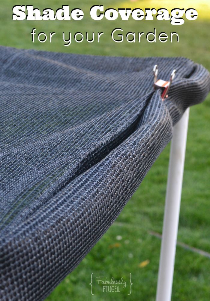 a black tarp with the words shade coverage for your garden on top of it