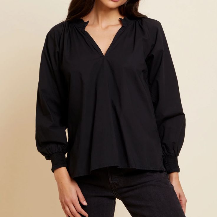 Size Small, Estelle Peasant Blouse In Jet Black. Never Worn. This Nation Ltd Estelle Peasant Blouse Is The Perfect Pick For A Cool Yet Chic Look! Cut With A Mock Neck, Balloon Sleeves, And Smocking At The Cuffs, This Blouse Will Give Your Wardrobe A Sassy Edge! Plus, The Side Slits Make For A Fashionable (And Comfy!) Finish. Your Closet Just Hit The Stylish Jackpot. Sizing Details: True To Size Materials & Care: 100% Pima Cotton Machine Wash Chic Black Peasant Top For Spring, Black Blouse With Smocked Cuffs For Fall, Black Peasant Top For Fall, Black Tops With Smocked Cuffs For Fall, Casual Black Blouse With Smocked Cuffs, Black Casual Blouse With Smocked Cuffs, Peasant Top With Blouson Sleeves For Work, Elegant Black Blouse With Smocked Cuffs, Black Workwear Top With Smocked Cuffs