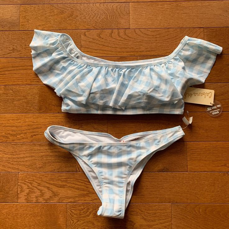 Cabana Del Sol Bikini-Blue/White Check Print-Rouching On Bottom-Ruffle Top Can Be Worn On Or Off The Shoulder-Top Has Pads-Last Pic Is To Show Fit-Same Bikini In A Different Print-Please See Measurements To Ensure Fit-Bundle & Save-Great Gift Idea! Lowball Offerstrades Summer Gingham Swimwear With Ruffles, Gingham Swimwear With Ruffles For Poolside, Gingham Ruffled Swimwear For Poolside, Vacation Gingham Swimwear With Ruffles, Gingham Swimwear With Ruffles For Vacation, Gingham Ruffled Swimwear For Vacation, On Or Off, Ruffle Top, Womens Swim