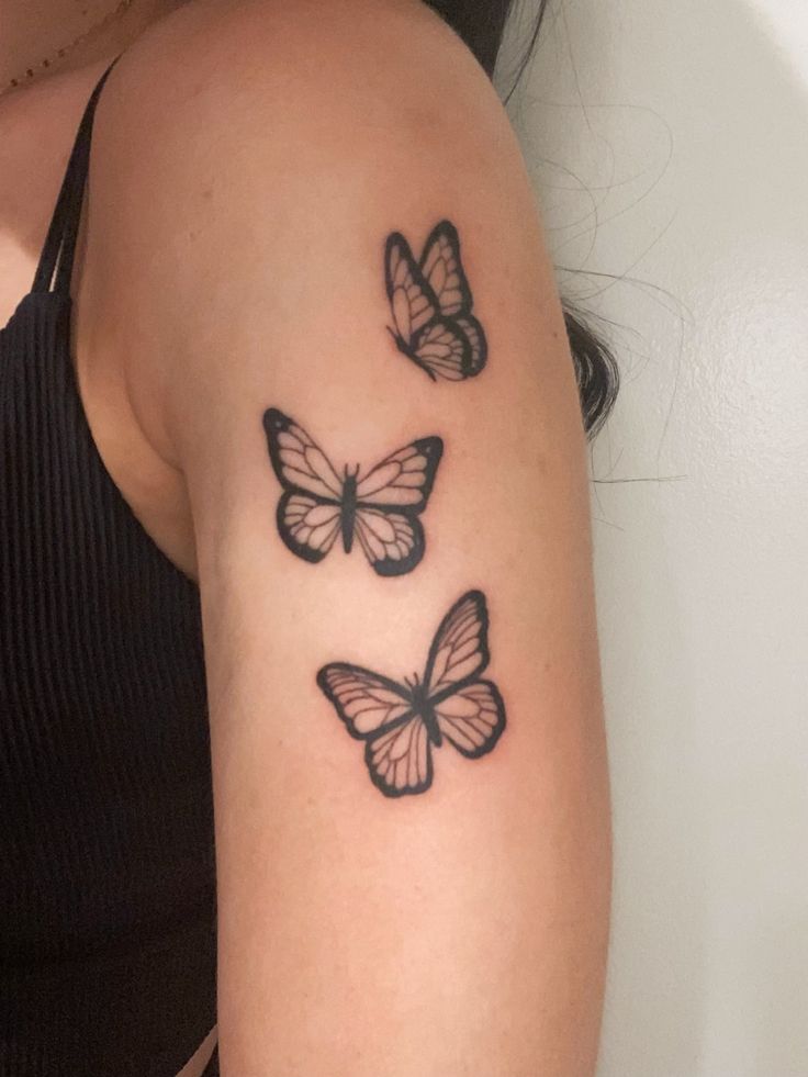 Butterfly tattoo arm Butterfly Down Arm Tattoo, Tattoo Ideas Female Butterflies On Arm, Women's Upper Arm Tattoos, Cute Tattoos For Women With Meaning Arm, Butterfly Arms Tattoos, Small Arm Tatooes, Butterfly Tattoo Arm Sleeve For Women, Butterfly Tattoos On Upper Arm, Butterflies Up The Arm Tattoo