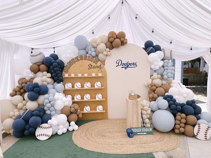 a baseball themed party with balloons and decorations