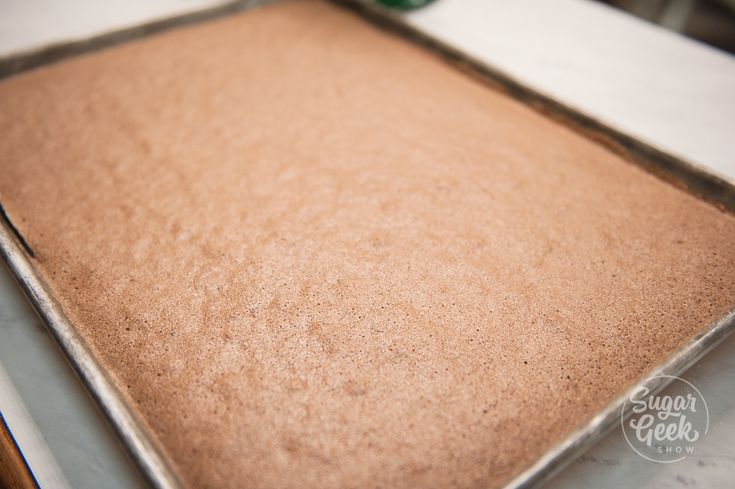 an uncooked cookie sheet sitting on top of a counter