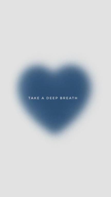 a blue heart with the words take a deep breath