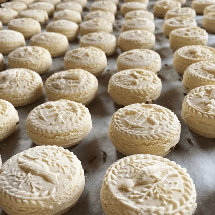 some cookies that are sitting on a baking sheet and ready to go into the oven