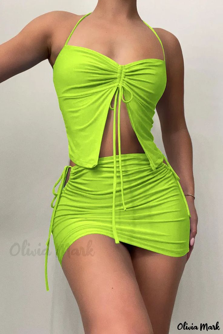 Olivia Mark - Frenulum Backless Halter Sleeveless Two-Piece Set in Fluorescent Green - Solid and Sexy Spring Green Tank Top For Club, Green Tank Top For Club In Spring, Green Summer Party Tank Top, Green Sleeveless Tank Top For Night Out, Fitted Green Tank Top For Club, Green Fitted Camisole Tank Top, Fitted Green Camisole Tank Top, Green Halter Neck Tank Top For Night Out, Green Tank Top For Night Out