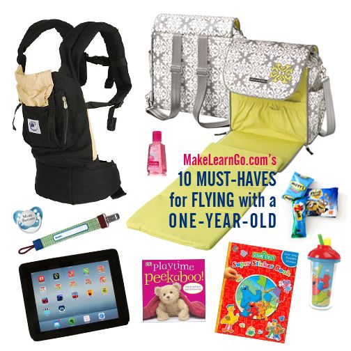 the contents of a child's travel bag including books, diaper and toys