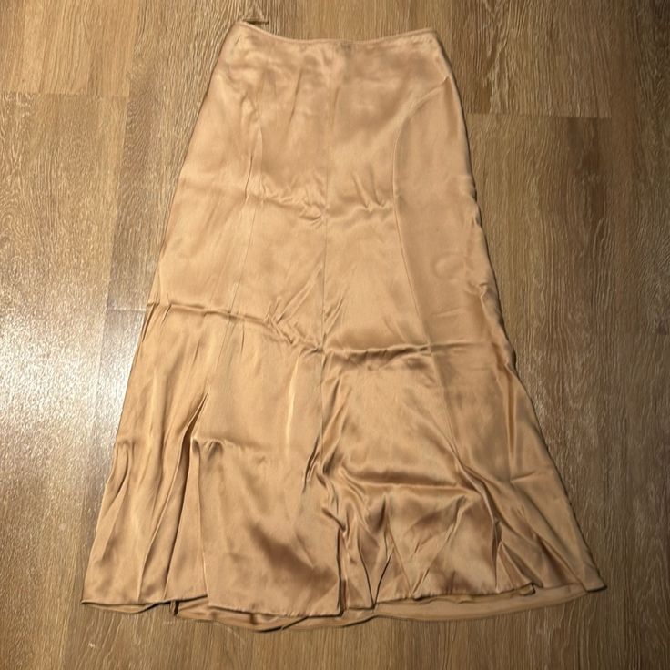 100% Silk. Brand New Never Worn Elegant Brown Asymmetrical Skirt, Elegant Brown Maxi Skirt For Party, Elegant Brown Skirt For Evening, Elegant Brown Evening Skirt, Elegant Evening Brown Skirt, Elegant Brown Maxi Skirt, Elegant Brown Flowy Maxi Skirt, Elegant Flowy Brown Maxi Skirt, Beige Silk Skirt For Formal Occasions