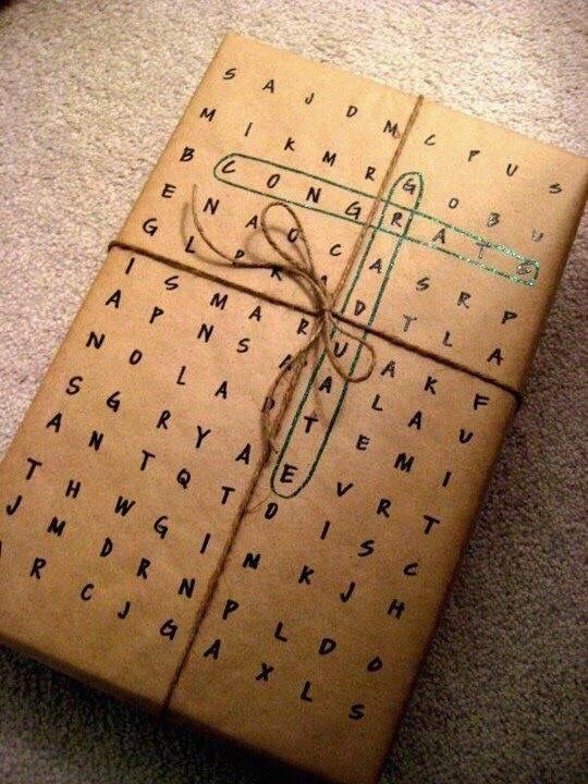 a brown box with writing on it sitting on the floor