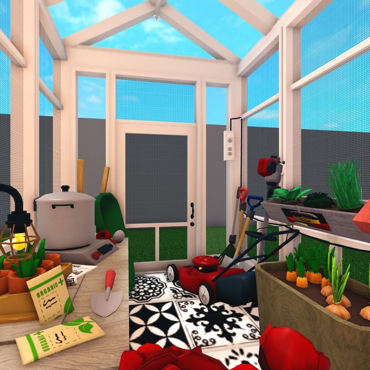 a room filled with lots of different types of vegetables and plants in containers on the floor