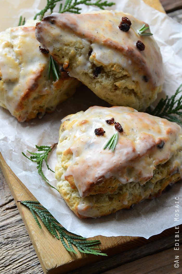 two scones with cheese and herbs on top