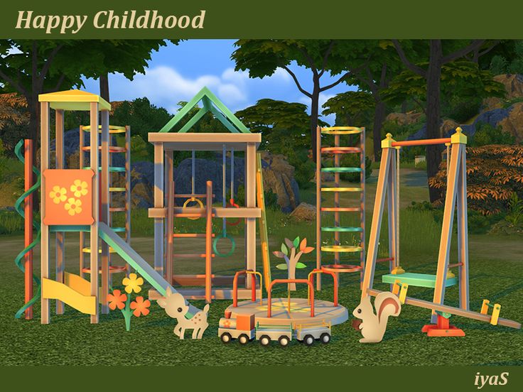 a group of children's play equipment in the grass