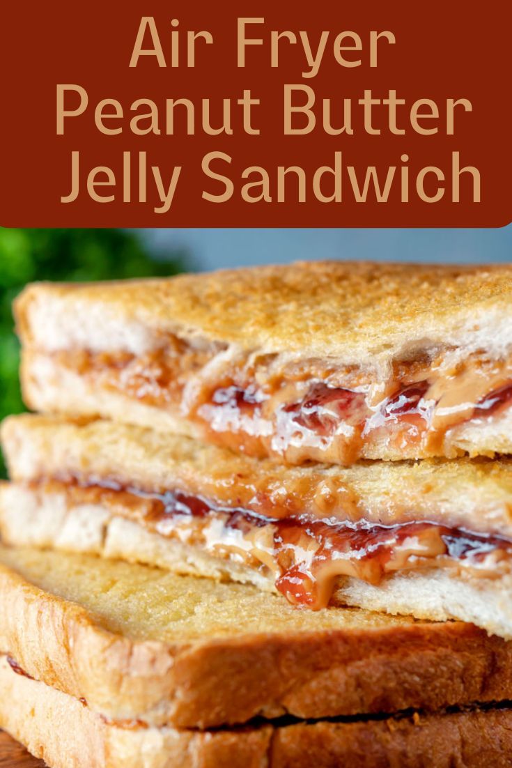 two grilled sandwiches stacked on top of each other with the words air fryer peanut butter jelly sandwich