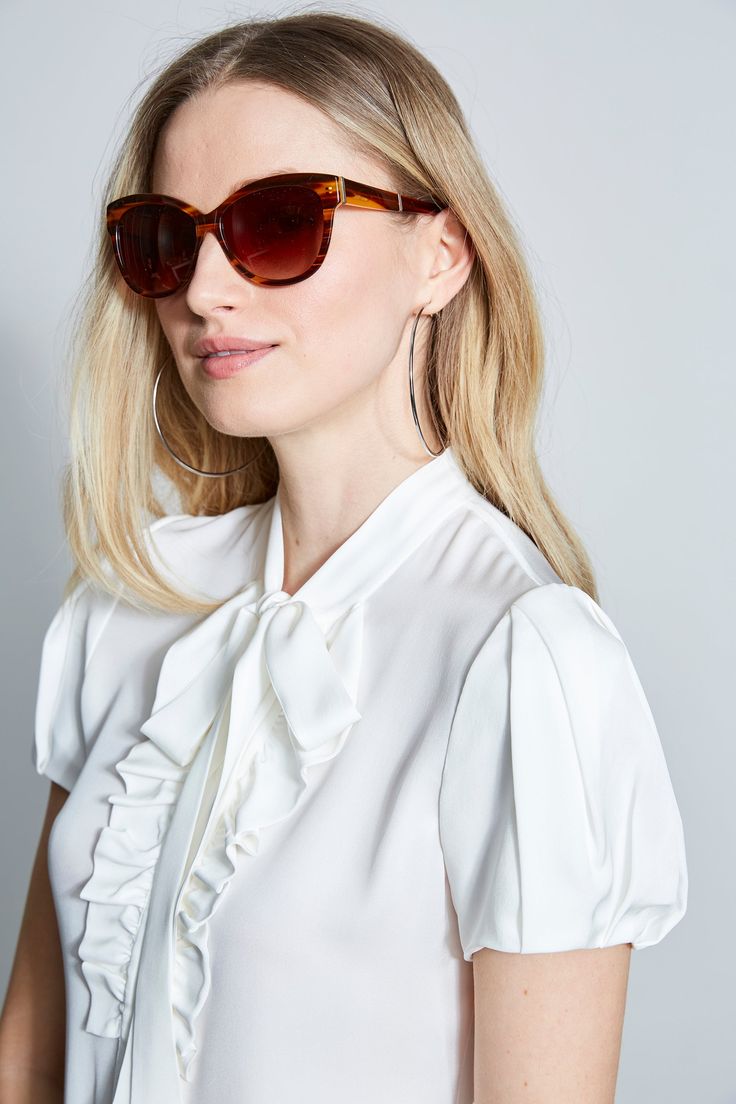 These chic oversized sunglasses feature a slight cat eye shape and are 100% UV protected. Perfect for sunny days, you will reach for these Sunglasses all season long. A hard case & cleaning cloth are included. Style #: EL123 Elegant Polarized Cat Eye Sunglasses For Day Out, Elegant Sunglasses With Uv Protection For Day Out, Elegant Cat Eye Sunglasses With Gradient Lenses For Summer, Elegant Sunglasses With Gradient Lenses For Day Out, Elegant Cat Eye Sunglasses For Day Out, Elegant Sunglasses With Uv Protection For Summer, Elegant Polarized Sunglasses For Summer, Elegant White Cat Eye Sunglasses With Uva Protection, Elegant Summer Cat Eye Sunglasses With Uva Protection