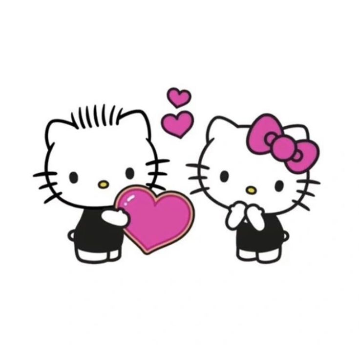 two hello kitty holding a heart shaped object