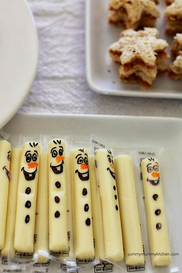 there are some crackers that have been decorated to look like snowmen