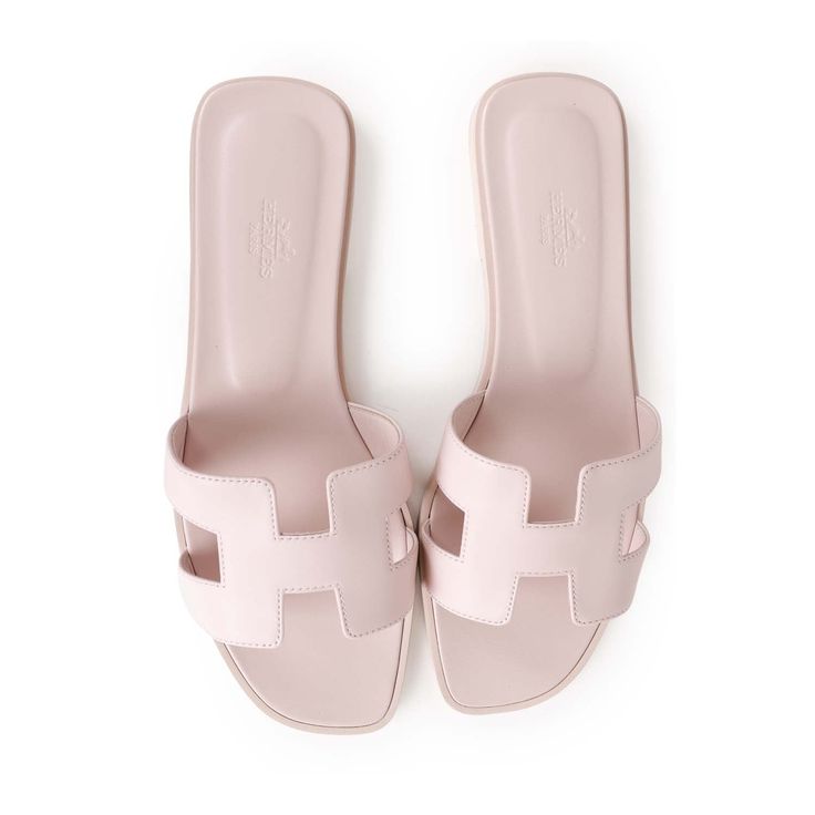 This pair of Oran Sandals are in Rose Petale calfskin with the iconic H crossover strap and rose petale leather soles. Origin: ItalyCondition: New and never wornAccompanied by: Hermes box, dustbags, and carebookSize: 40 EU Hermes Oran Sandals, Dr Shoes, Mode Zara, Shoe Wishlist, Pink Aura, Doutzen Kroes, Hermes Oran, Girly Shoes, Shoe Inspo