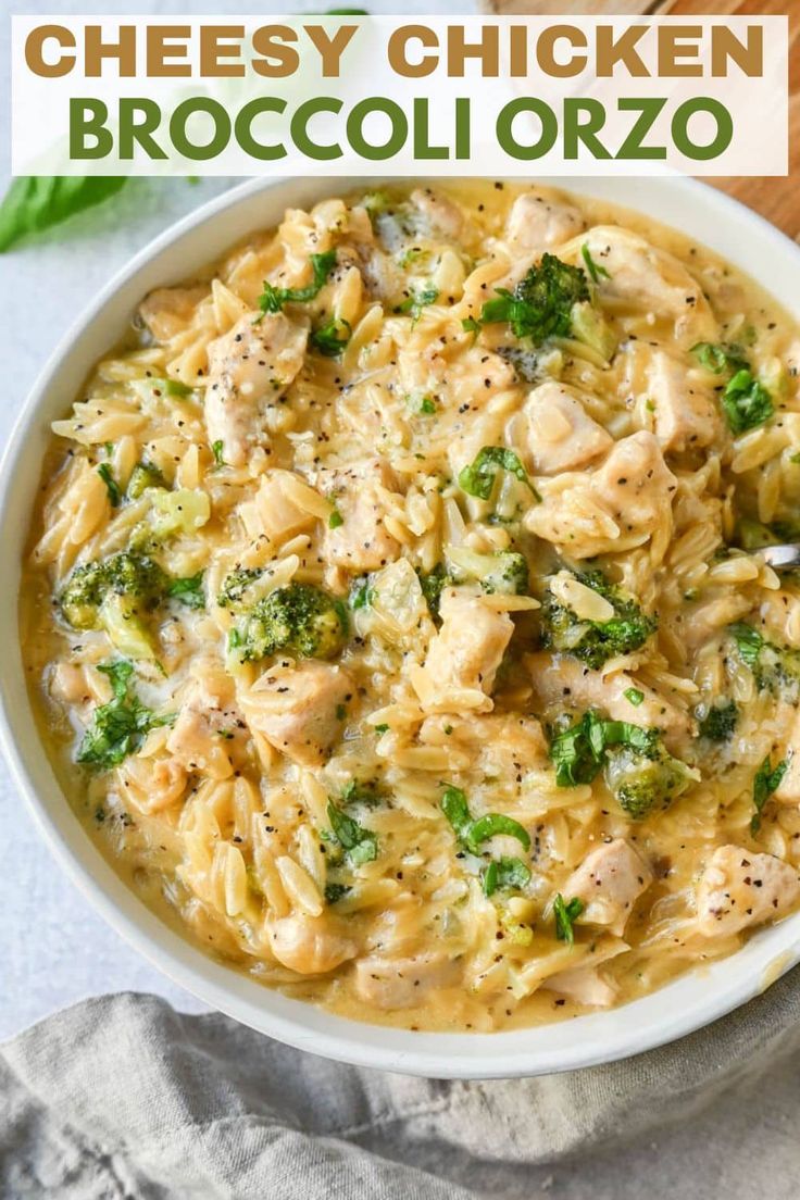 chicken broccoli orzo in a white bowl with text overlay that reads cheesy chicken broccoli orzo