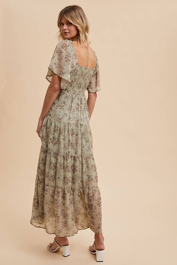 Get ready to turn heads at any wedding with our Isn't It Romantic Floral Dress! With its feminine and sweet design, this dress is the perfect choice for any fall wedding. Don't miss out on the opportunity to be the best-dressed guest! Color: Sage Floral maxi dress Sweetheart neckline Decorative tie front Flutter sleeves Fully lined 100% polyester Isn't It Romantic, Icon Clothing, Wedding Engagement Gifts, Ditsy Floral Print, Fall Candles, Baby & Toddler Clothing, Ditsy Floral, Flutter Sleeves, Floral Maxi