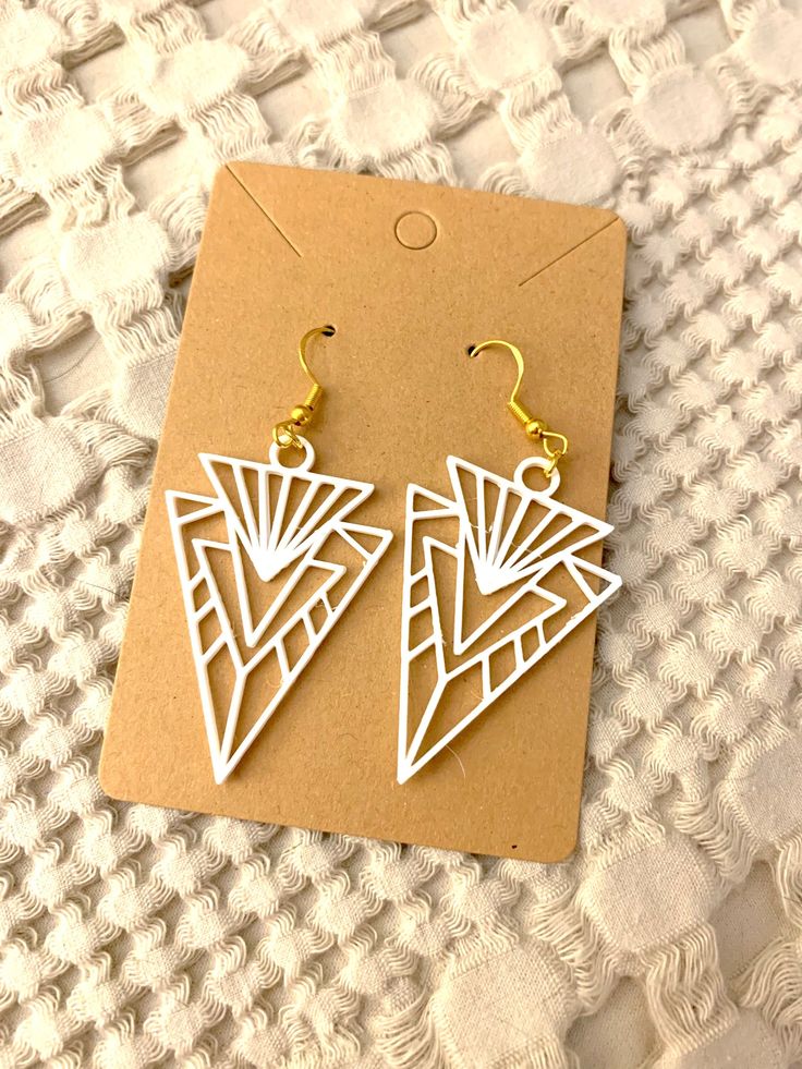 Geometric and art deco style dangle earrings Retro White Dangle Earrings, Artistic White Drop Earrings, Retro White Drop Earrings, White Geometric Bohemian Earrings, White Bohemian Geometric Earrings, Bohemian White Geometric Earrings, Vintage White Chandelier Earrings Gift, Retro White Dangle Jewelry, Retro Geometric Jewelry Gift