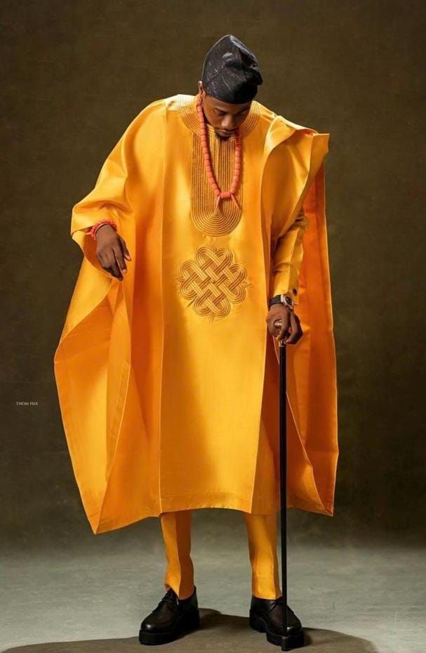 This elegant outfit is a complete set of agbada wear for men who wants to go all native. Its beautiful and comfy, made for the big men and designed with high quality material to bring out that uniqueness in you. The outfit is styled in such a way that it is suitable for any kind of occasion.  The shirt is designed with high quality materials and also high tailoring standards. This set comes with a matching shirt and pant. The pant is styled with a draw string for wearer's ease. Buyers can reques African Men Clothing, Suit Prom, Black And White Gown, Custom Made Shirts, Suit Men, Red Carpet Event, Wedding Suit, Stunning Gowns, Groom Suit