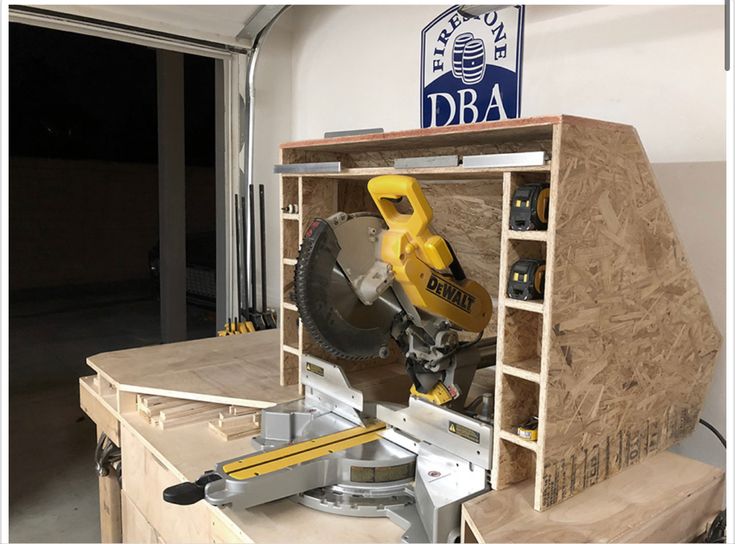 a work bench with tools on it in a garage